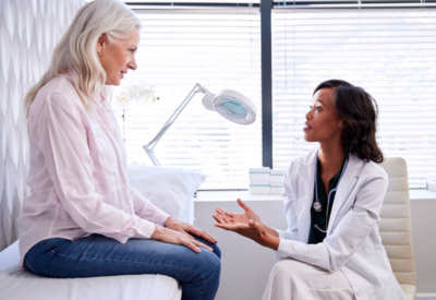 Female physician with patient